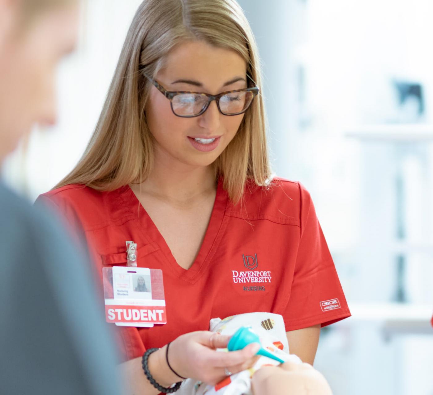 Female Nursing Student in Simulation Lab