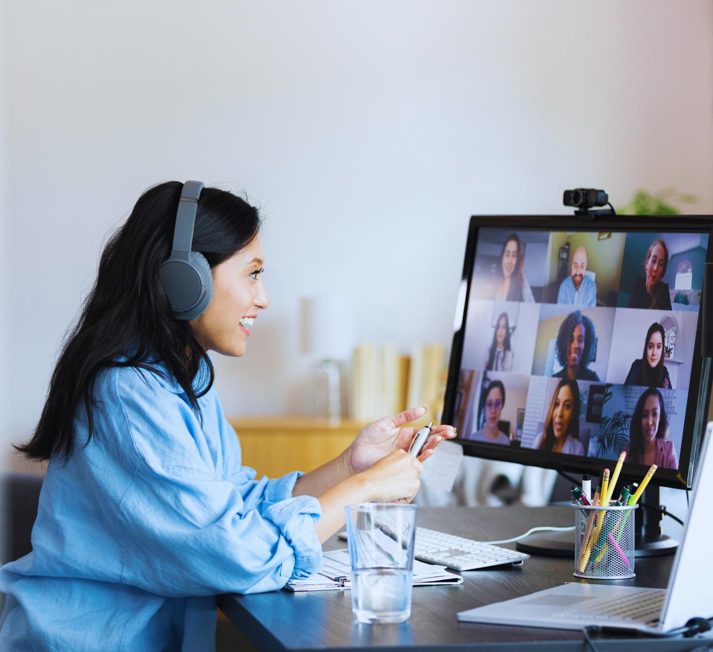 Young adult women with headphones on a video conference call