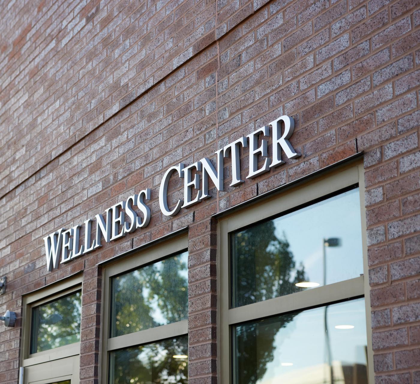 The exterior of the Wellness Center on the W.A. Lettinga campus, focusing on the "Wellness Center" sign